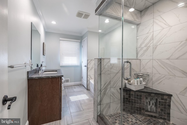 full bathroom featuring a tub to relax in, visible vents, ornamental molding, vanity, and a shower stall