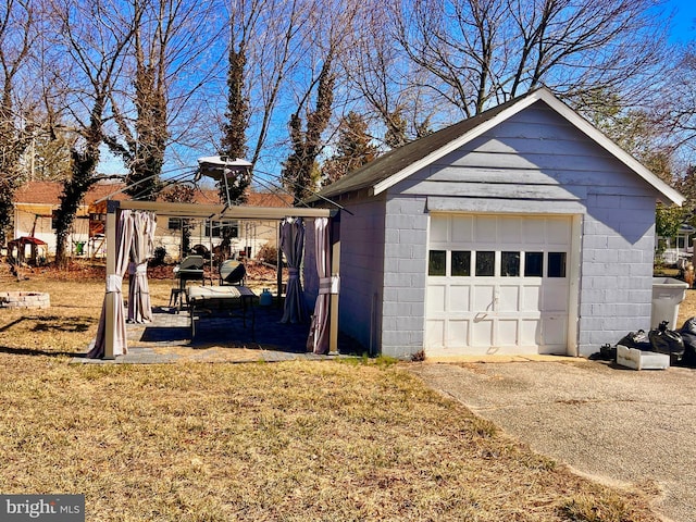 exterior space featuring concrete driveway