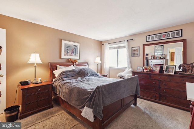 bedroom featuring carpet