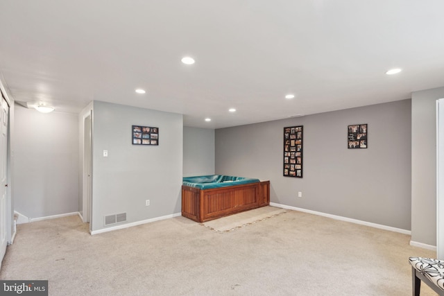 playroom with recessed lighting and baseboards