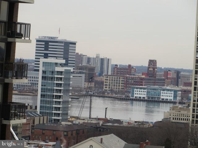 property's view of city featuring a water view