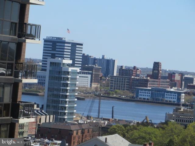 property's view of city with a water view