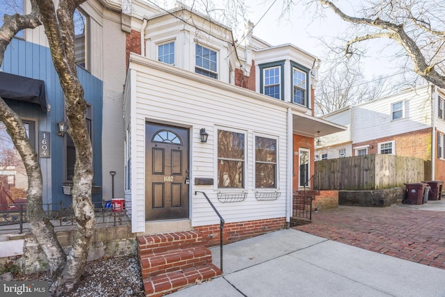 view of front of property with fence