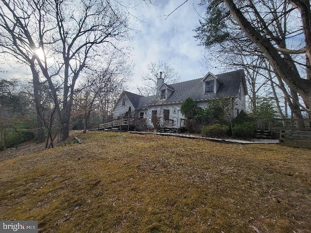 view of front of property with a deck