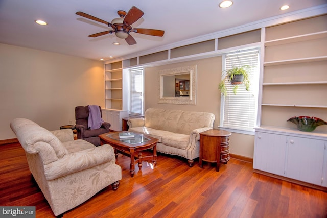 living area featuring recessed lighting, baseboards, wood finished floors, and ceiling fan