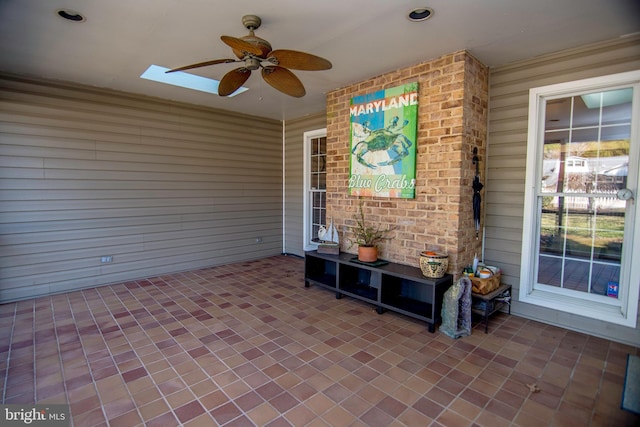 view of patio featuring ceiling fan