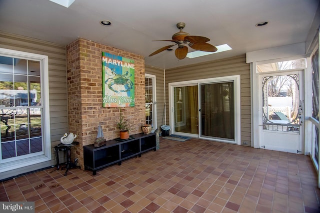 view of patio featuring ceiling fan