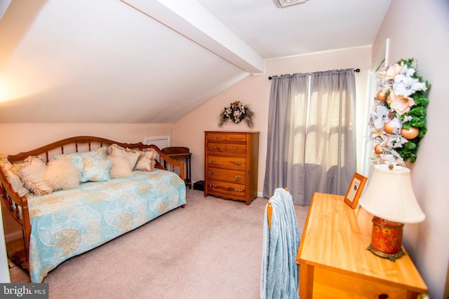 bedroom featuring lofted ceiling with beams, visible vents, and carpet floors