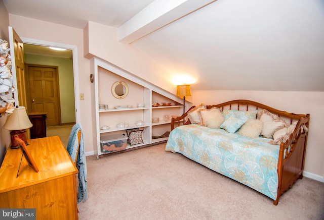 bedroom featuring vaulted ceiling with beams, baseboards, and carpet floors