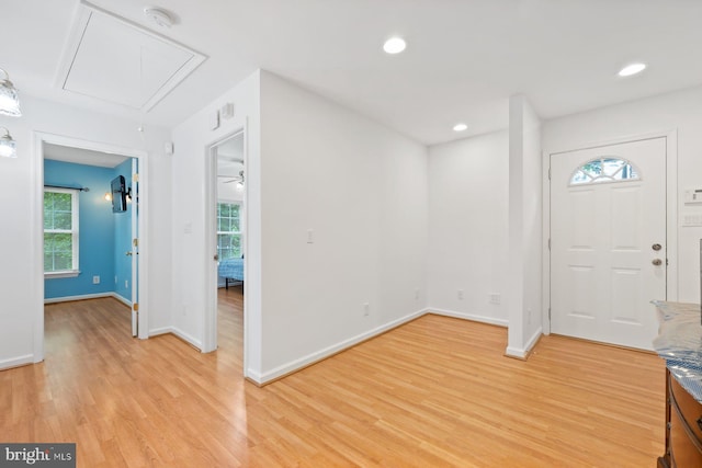 10402 Hayes Ave, Silver Spring, MD 20902 - foyer entrance featuring light wood-style flooring, baseboards, and recessed lighting