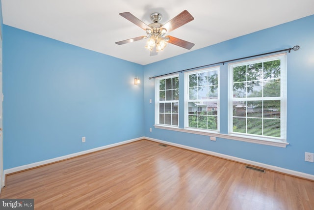 10402 Hayes Ave, Silver Spring, MD 20902 - unfurnished room featuring baseboards, wood finished floors, and ceiling fan