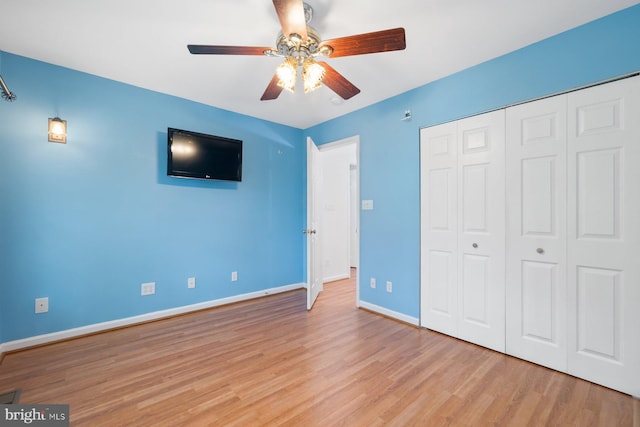 10402 Hayes Ave, Silver Spring, MD 20902 - unfurnished bedroom featuring wood finished floors, baseboards, a closet, and a ceiling fan
