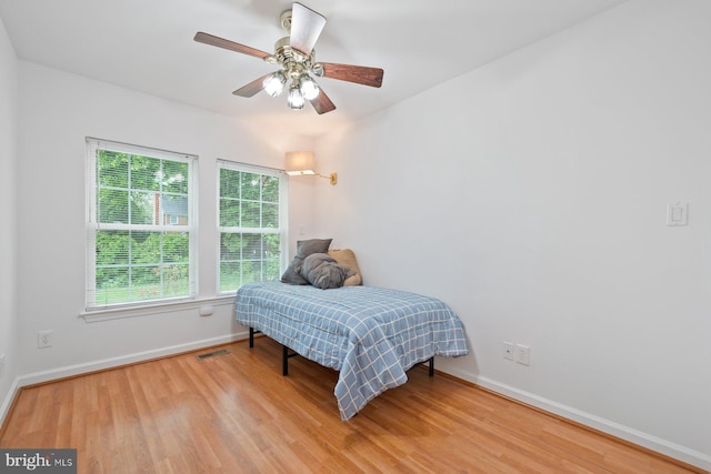 10402 Hayes Ave, Silver Spring, MD 20902 - bedroom featuring wood finished floors, baseboards, and a ceiling fan