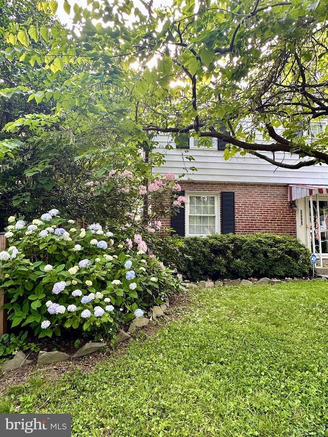 10402 Hayes Ave, Silver Spring, MD 20902 - view of side of home with brick siding and a yard
