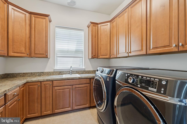 114 Cloak Ln, Lake Frederick, VA 22630 - washroom featuring separate washer and dryer, cabinet space, and light tile patterned floors