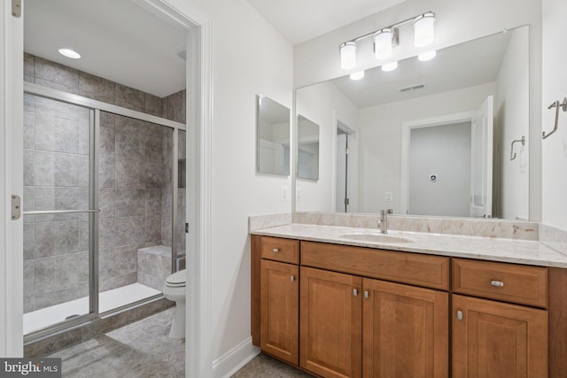 114 Cloak Ln, Lake Frederick, VA 22630 - bathroom featuring vanity, toilet, a stall shower, and baseboards