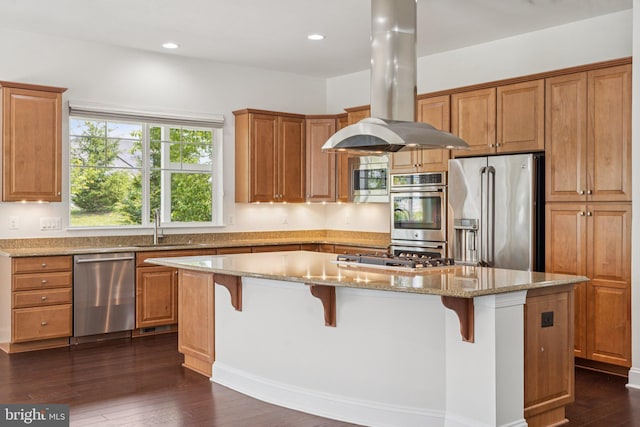 114 Cloak Ln, Lake Frederick, VA 22630 - kitchen featuring stainless steel appliances, island range hood, a center island, a sink, and a breakfast bar area