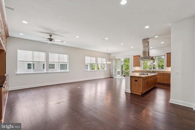 114 Cloak Ln, Lake Frederick, VA 22630 - unfurnished living room with dark wood-type flooring, baseboards, ceiling fan, and recessed lighting