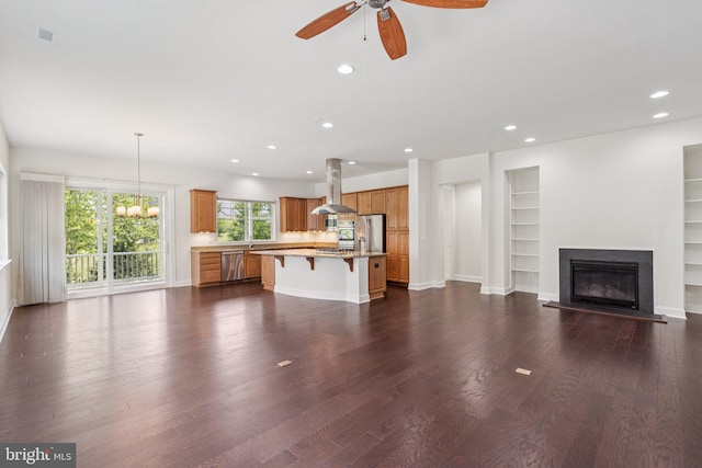 114 Cloak Ln, Lake Frederick, VA 22630 - unfurnished living room featuring recessed lighting, ceiling fan, dark wood-style floors, a glass covered fireplace, and baseboards