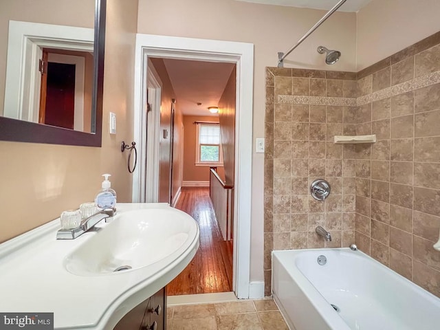 6 Washington Ave, Norristown, PA 19403 - bathroom featuring washtub / shower combination, vanity, and baseboards