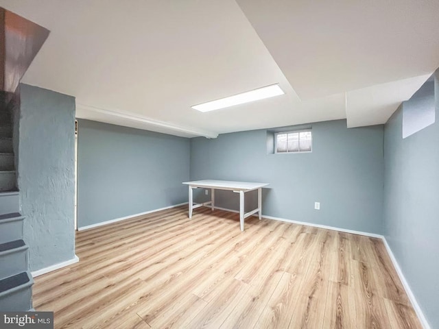 6 Washington Ave, Norristown, PA 19403 - below grade area featuring wood finished floors, stairway, and baseboards