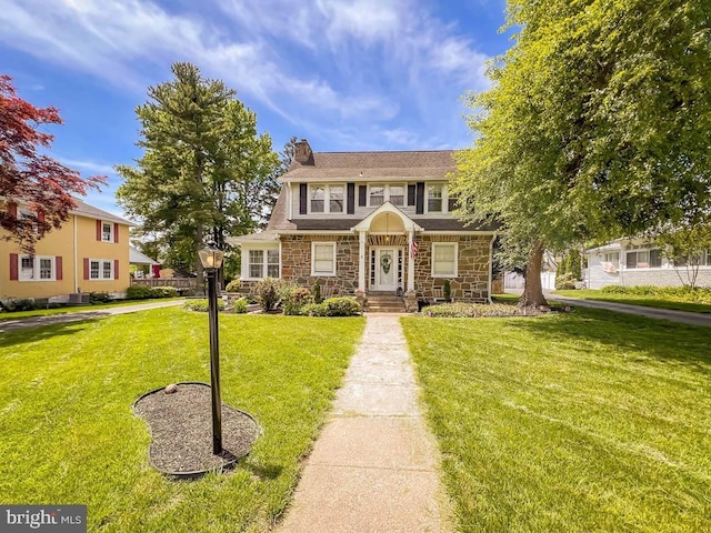 6 Washington Ave, Norristown, PA 19403 - view of front of house with stone siding and a front lawn