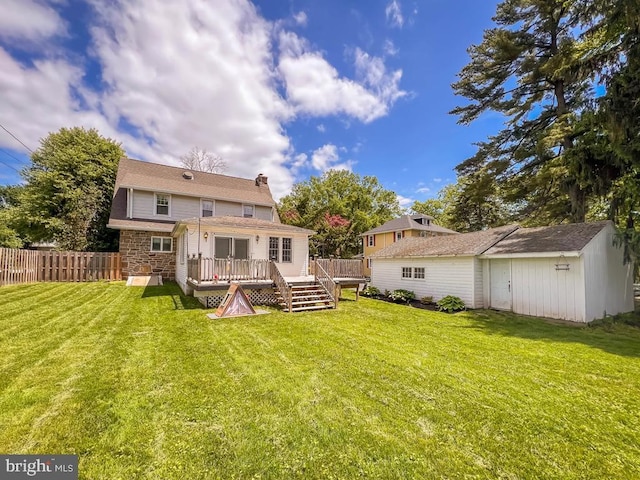 6 Washington Ave, Norristown, PA 19403 - rear view of property featuring a deck, an outdoor structure, and a chimney
