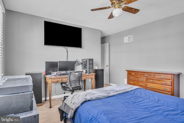 bedroom featuring visible vents, baseboards, carpet, and ceiling fan