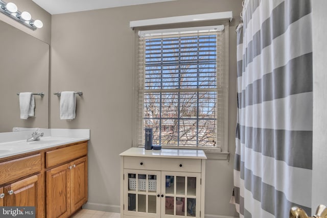 bathroom featuring vanity and a shower with curtain