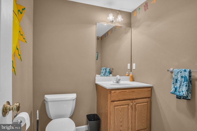 half bath with toilet and vanity