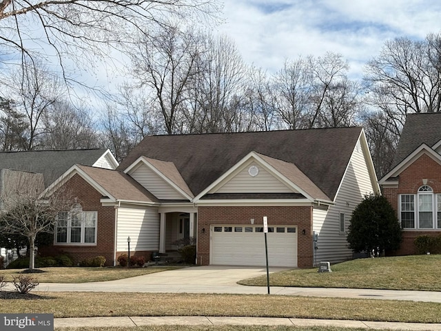 view of front of property featuring concrete driveway, brick siding, and a front yard