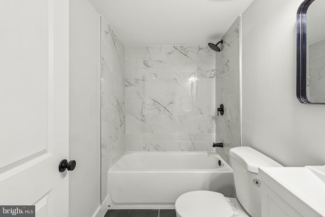 bathroom featuring vanity, toilet, and shower / tub combination