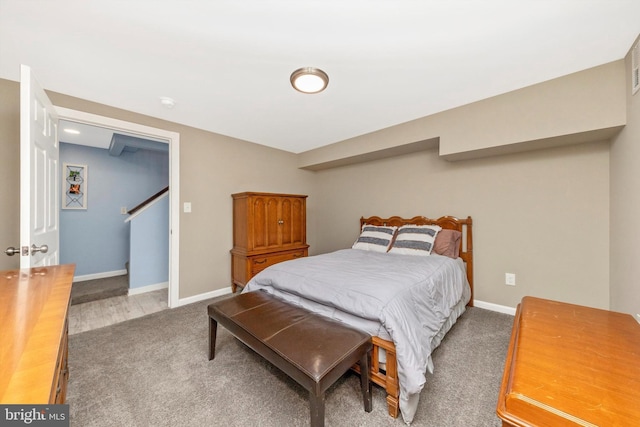 carpeted bedroom with baseboards