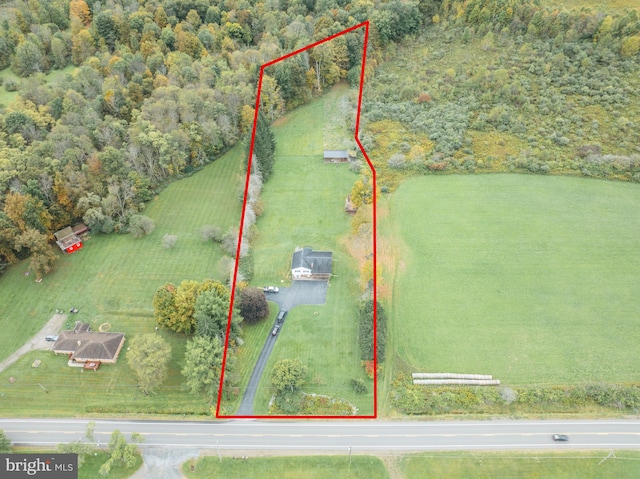 birds eye view of property featuring a rural view