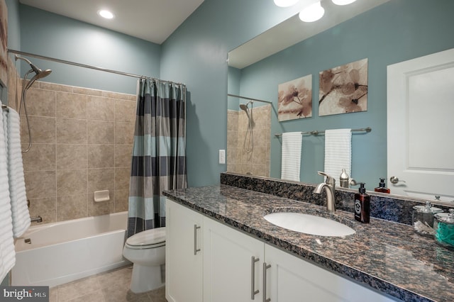 bathroom with vanity, toilet, tile patterned flooring, and shower / bath combination with curtain