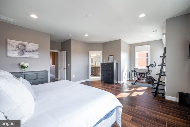 bedroom featuring recessed lighting, wood finished floors, and baseboards