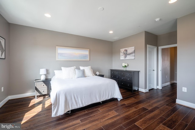 bedroom featuring recessed lighting, baseboards, and wood finished floors