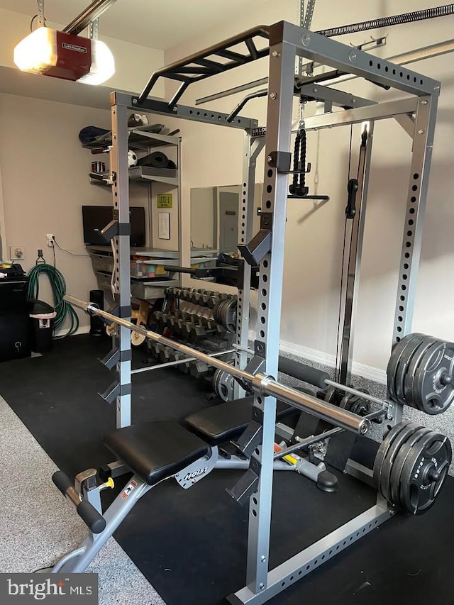 exercise room featuring a garage