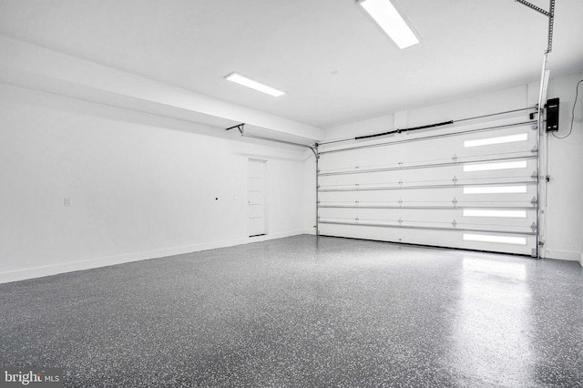 garage with baseboards