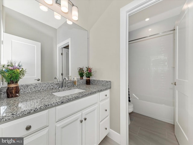 full bath featuring toilet, shower / tub combination, and vanity