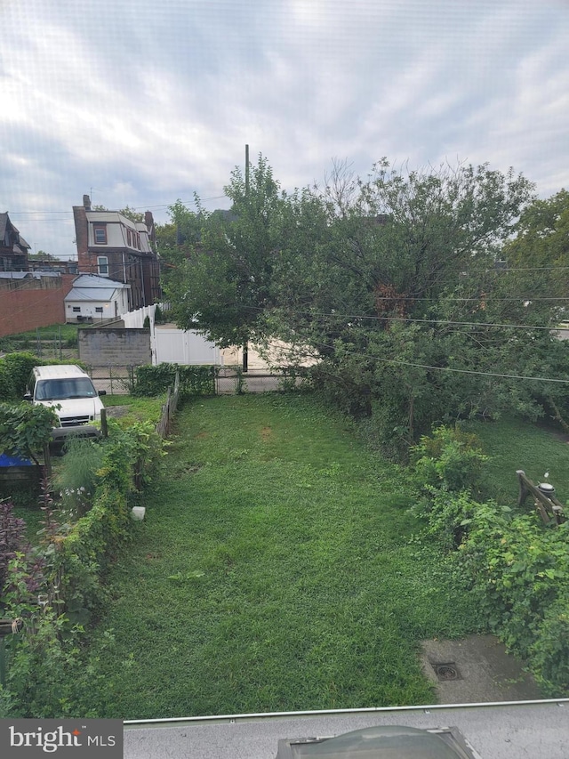 view of yard featuring fence