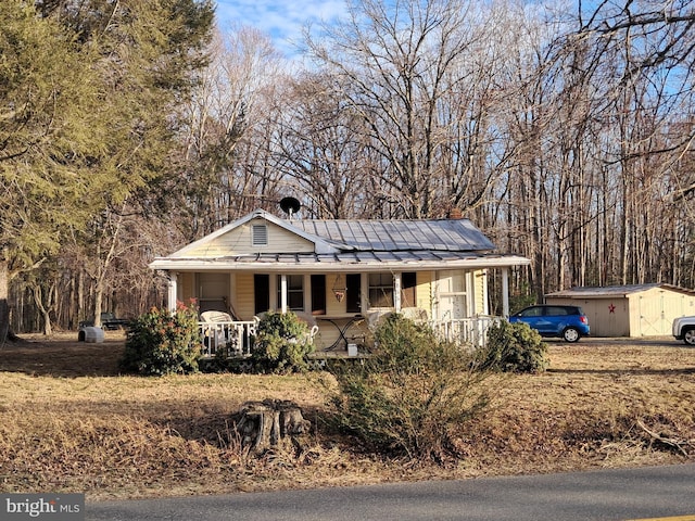 view of front facade with a porch and an attached garage