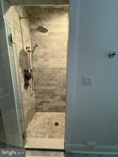 bathroom featuring a stall shower