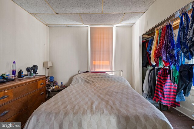 bedroom with a paneled ceiling