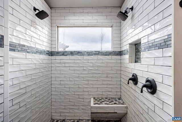 full bathroom featuring a tile shower