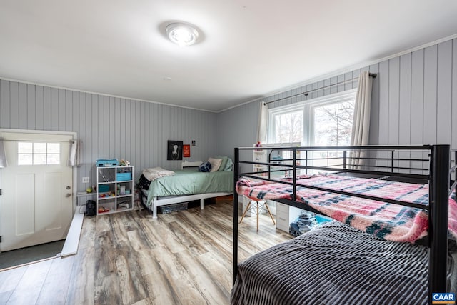 bedroom with wood finished floors