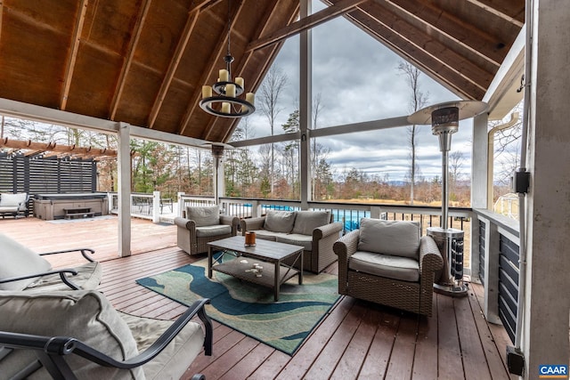 sunroom / solarium featuring vaulted ceiling