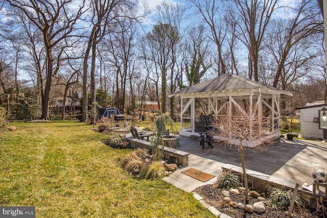 view of yard with a gazebo and a patio