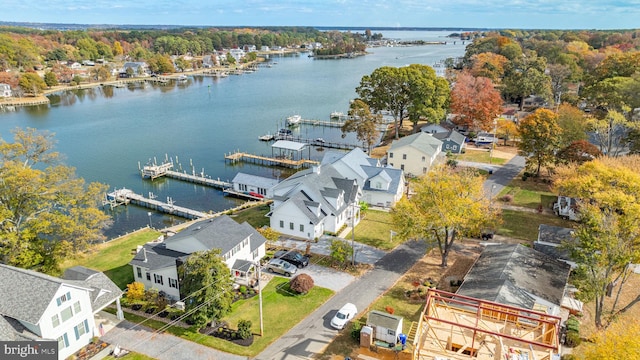 aerial view with a water view and a residential view