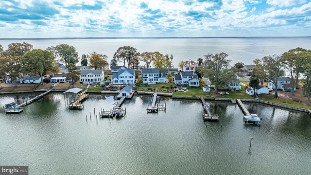 view of water feature featuring a residential view and a dock